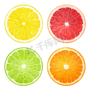 切片水果摄影照片_柠檬葡萄柚石灰橙色切片水果查出在白色背景