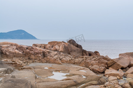 菩萨摄影照片_舟山群岛普陀山的岩石和海滩，是菩萨阿瓦洛基特拉（观音）中国菩萨的一个著名遗址)