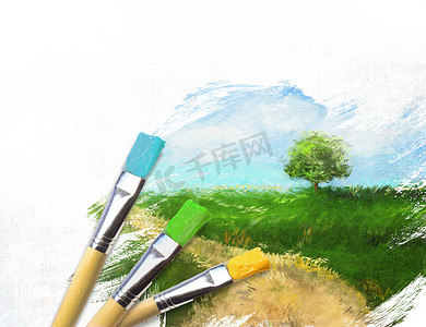 艺术家画笔与半完成画的风景画布