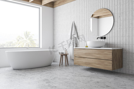 阁楼白色瓷砖浴室角落，浴缸和水池