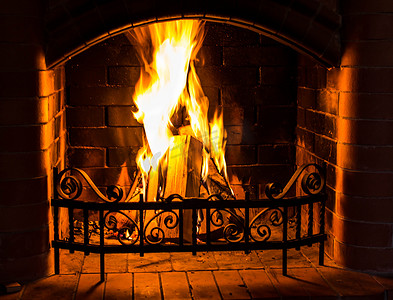 首页火燃烧的壁炉。季节性和假日火.