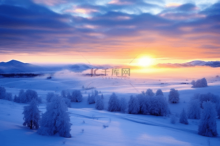 日出雪山背景图片_冬天日出唯美雪景背景摄影图