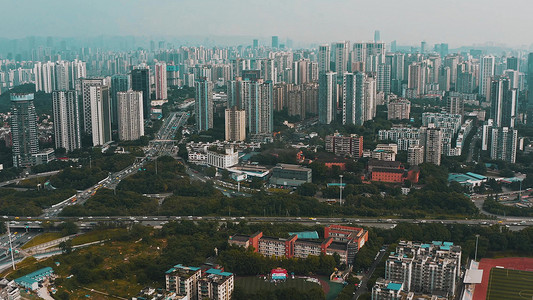 重庆城市建设摄影照片_航拍重庆北部新区密集高楼车流城市建设
