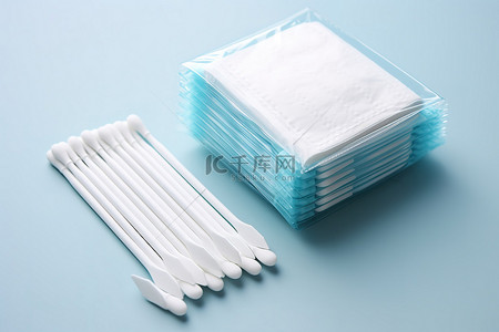 卫生巾背景图片_白色磨头一次性卫生巾 p01
