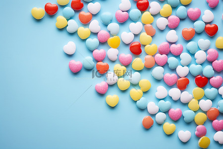 英语背景图片_彩色糖果爱和蝴蝶被放置在圆点背景上