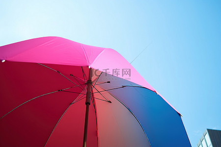 雨伞背景图片_一把彩色雨伞