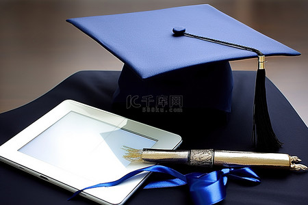 电脑背景图片_毕业帽旁边放着平板电脑和文凭