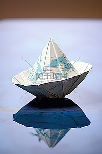 地球背景图片_地球仪上的纸船
