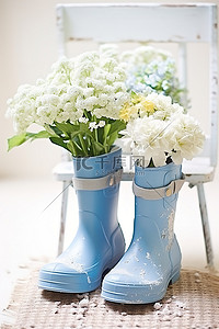 鞋花背景图片_白蓝色橡胶靴和带花的软管