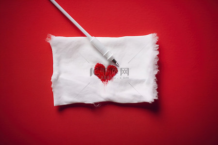 纸巾上有一颗红心的针