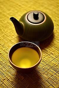 地毯背景图片_一碗黄茶，旁边是一个放在编织地毯上的碗