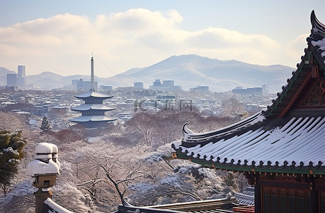 旅游雪山背景图片_冬季首尔的景色 韩国首尔 雪山