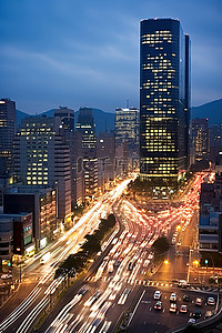 汽车道路夜景背景图片_首尔市中心道路有汽车交通