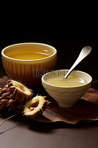 茶杯子背景图片_一碗菠萝蜜旁边有一个杯子和勺子
