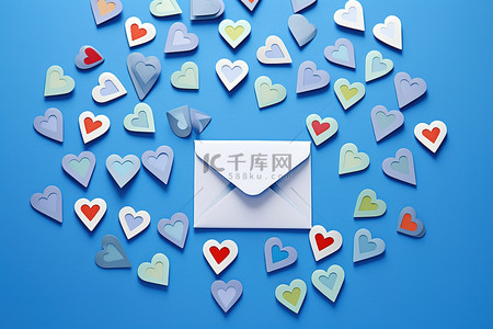 一封信图背景图片_一封信的心和一个蓝色的信封