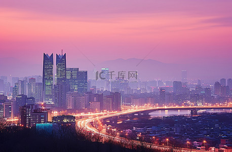 楼背景图片_首尔的天际线在日落时照亮