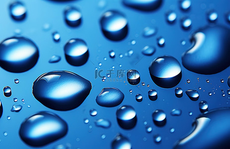 水滴背景图片_蓝色表面上的水滴