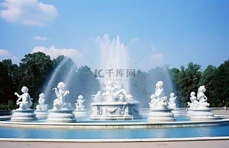 神兽雕像背景图片_公园里的喷泉，上面有雕像