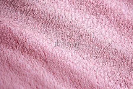 斑点的背景图片_带有白色小斑点的粉色毛巾的特写