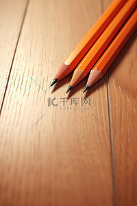 木纹背景图片_硬木地板上的两支铅笔
