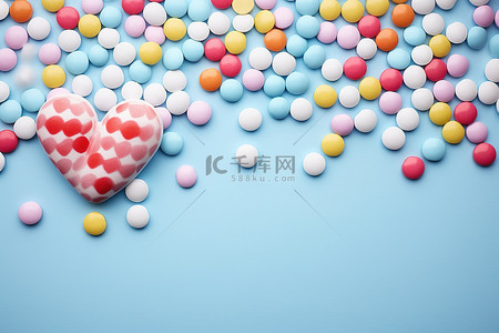 圆点背景图片_彩色糖果爱和蝴蝶被放置在圆点背景上
