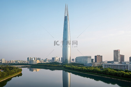 湖上游船卡通背景图片_世界上最高的建筑坐落在俯瞰城市的山上