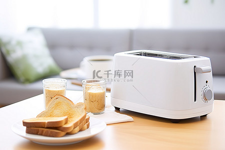 烤面包烤面包背景图片_咖啡桌旁边的电动烤面包机