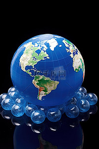 蓝色环保地球背景图片_由蓝色小球体制成的地球仪