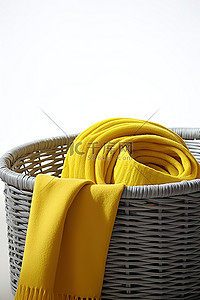 围巾背景图片_灰色塑料篮中的黄色和灰色围巾