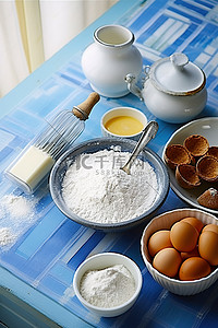桌球桌背景图片_烤鸡蛋黄油和面粉放在桌面上