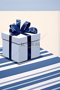 生日对折贺卡背景图片_白色条纹桌上带礼品盒的生日贺卡