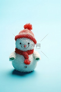 蓝色背景中戴着红帽子和围巾的小雪人