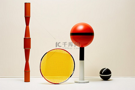 羽毛球背景图片_两个羽毛球一个羽毛球拍和一套球拍