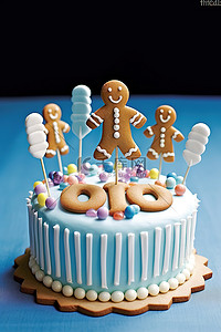 100 岁生日蛋糕，配有姜饼男孩和棉花糖棒棒糖