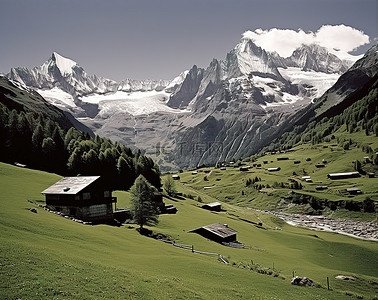 雪山草地背景图片_瑞士阿尔卑斯山的村庄 瑞士