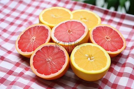 绿色背景图片_橙色和绿色的葡萄柚照片