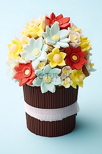糖果派对背景图片_纸杯蛋糕上有巧克力糖霜和鲜花