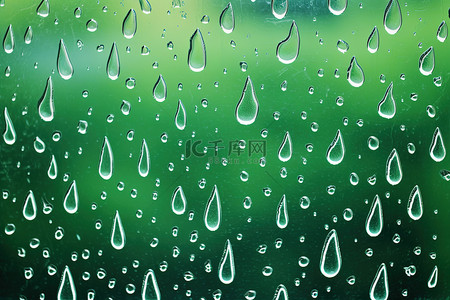 雨季背景图片_雨滴落在玻璃上