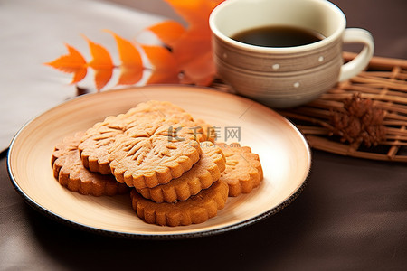 饼干食品背景图片_一盘饼干和一壶茶
