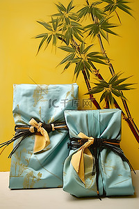 竹包装背景图片_白纸上的两个包装好的礼物和一棵竹树