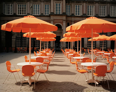 雨伞背景图片_一套橙色雨伞和一组桌子