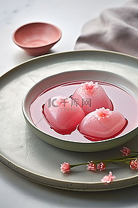 茶背景图片_一个空盘子，上面有粉色果冻