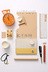 回形针背景图片_一块板，内衬多种办公配件，包括时钟钢笔回形针和橡皮