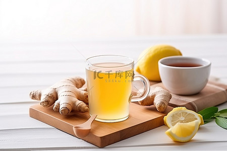 香料背景图片_白桌上放着柠檬的热姜茶