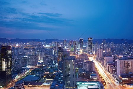 黄昏城市背景图片_首尔黄昏时分的城市夜景