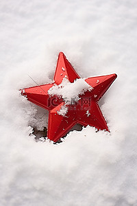 冬天背景图片_雪中​​的红星