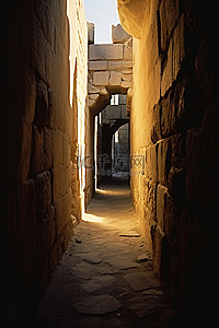 狭窄背景图片_一栋有古老石墙的老建筑内的狭窄通道