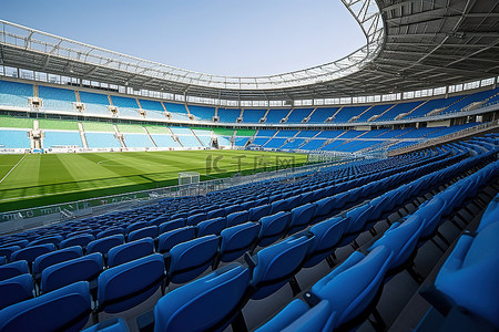 世界杯足球背景图片_在有蓝色椅子和座位的体育场内
