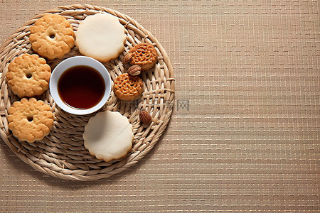 糕点食品背景图片_桌上的糕点和一杯茶