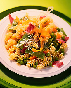 沙拉背景图片_盘子里新鲜绿色蔬菜的意大利面沙拉